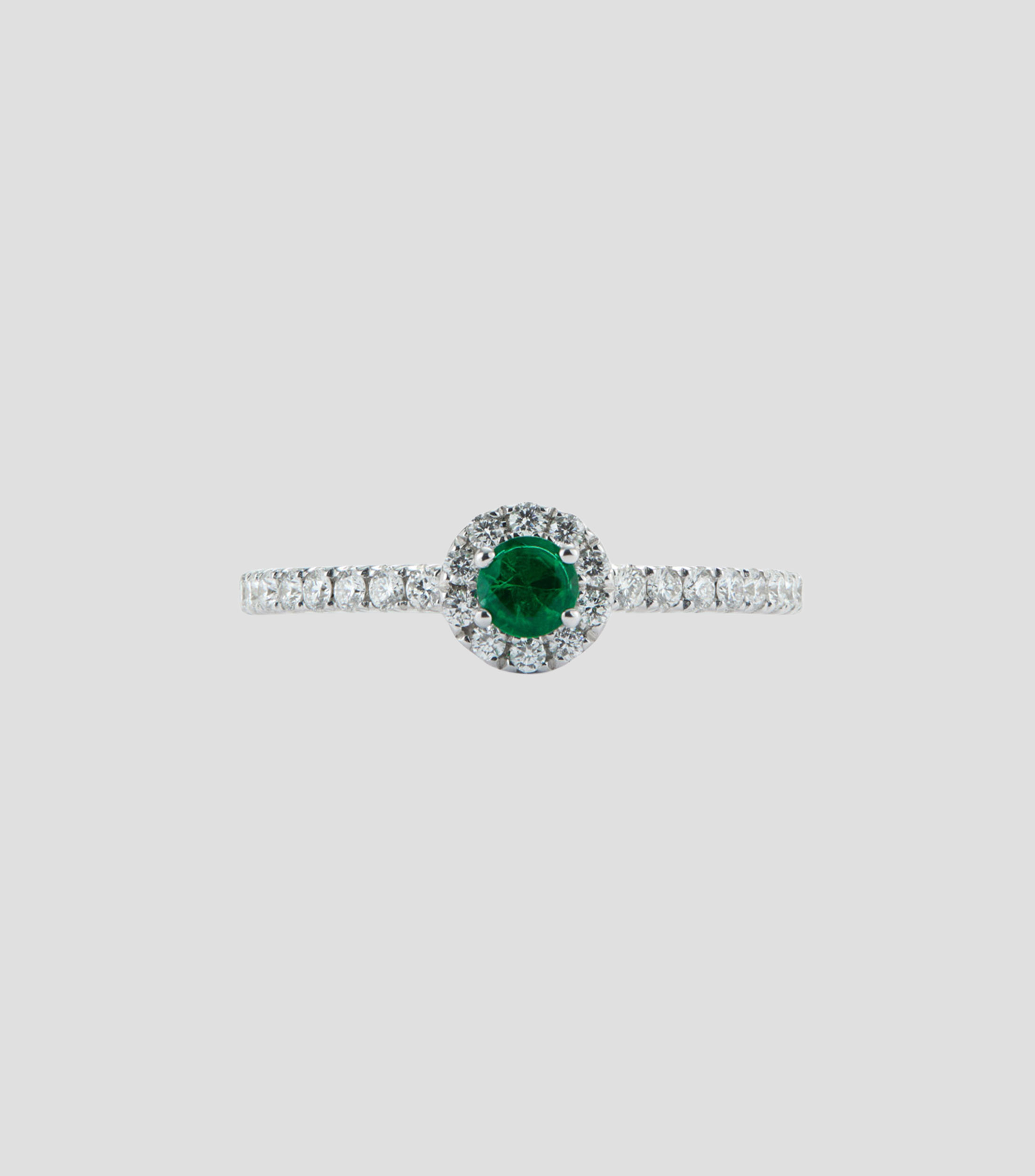 Anillo de Oro blanco de 18 Kilates con esmeralda Mujer